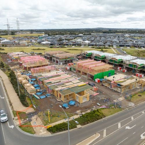 Birds eye view of a building site with town houses been built