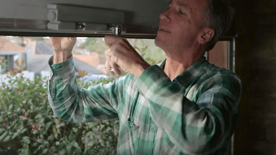 Man fixing garage door