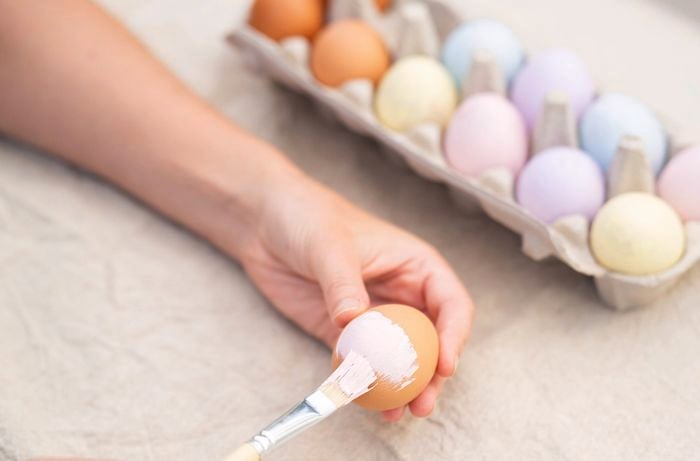 Painting Easter egg with pastel colour