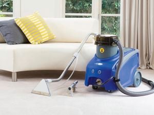 Britex carpet cleaner and a couch