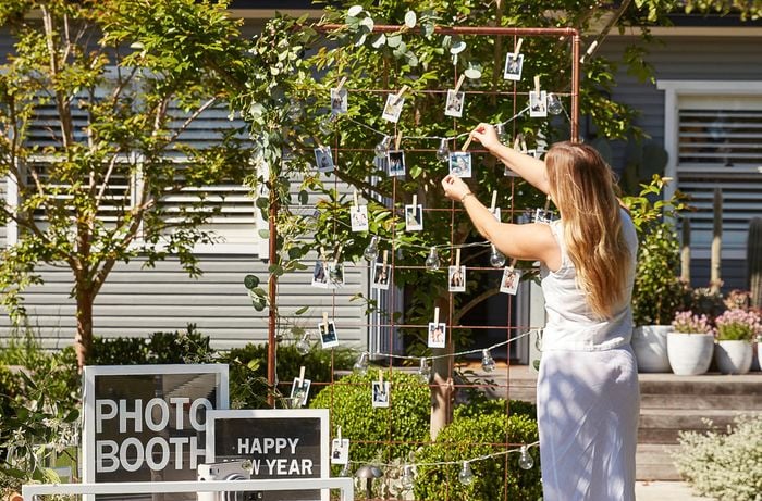D.I.Y. photo booth frame size – decorating with Polaroid photos and creating memories.