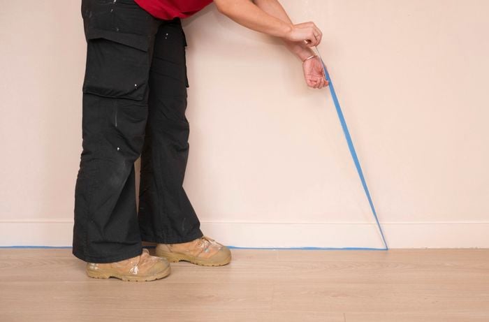 Remove painter’s tape while the wall paint is still slightly tacky 