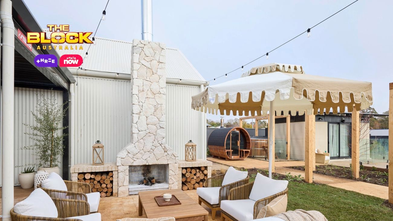 Outdoor area with an outdoor setting, outdoor fire place, gazebo and an outdoor room in it.