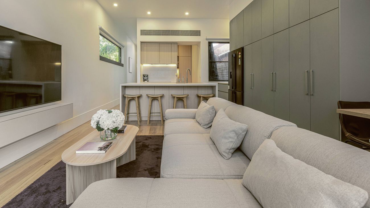 Soft furnishings such as cushions and rugs create an inviting mood. 