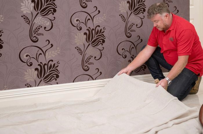 Cover the floor with drop cloths.