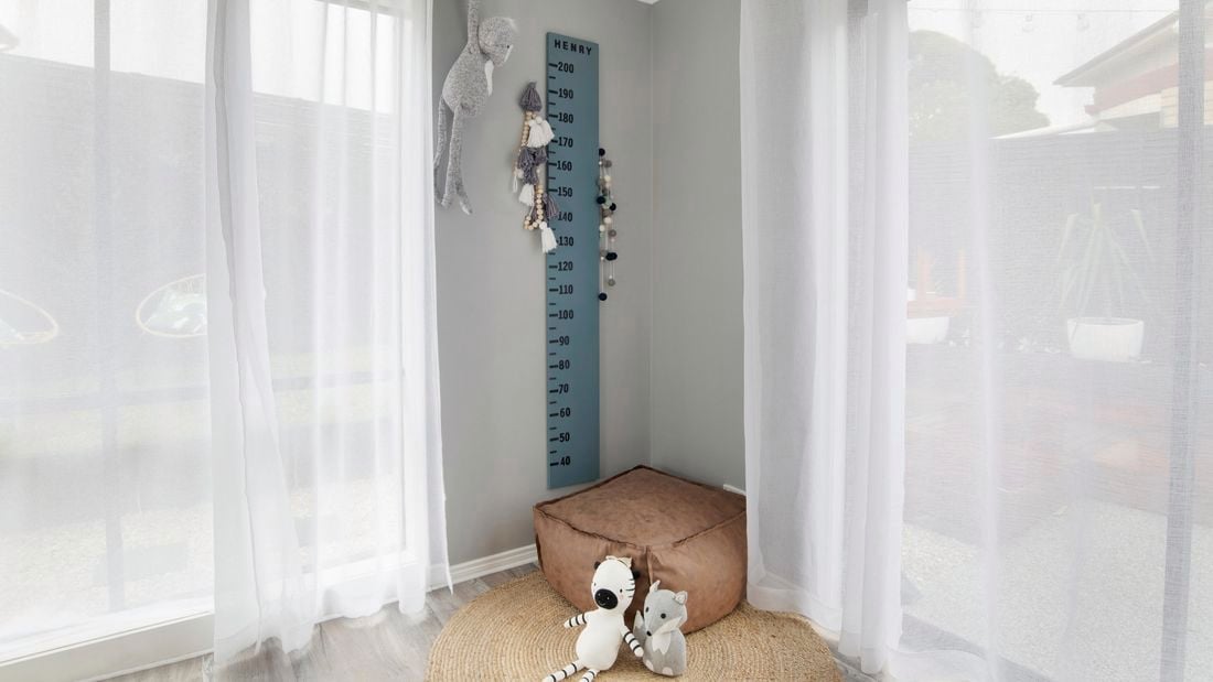 A completed and mounted height chart for a 2 meter call kid named Henry