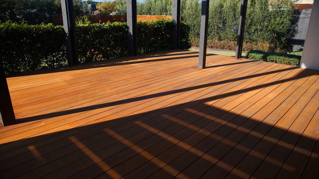 This image showcases the completed result of sanding a timber deck.