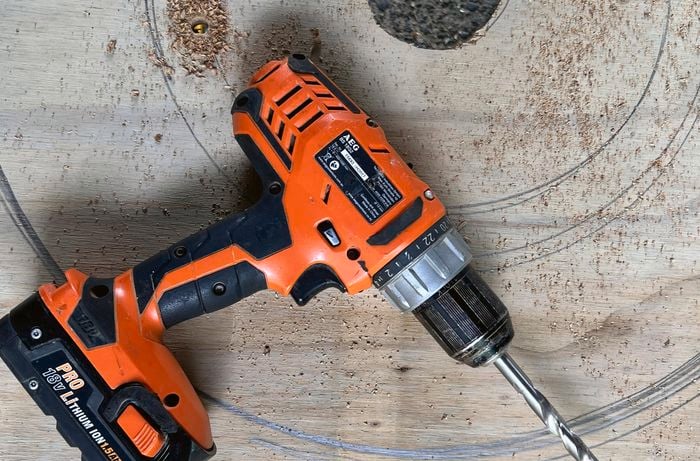 A drill used to drill into plywood