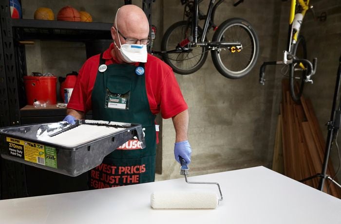 A second undercoat being applied to a sheet of MDF