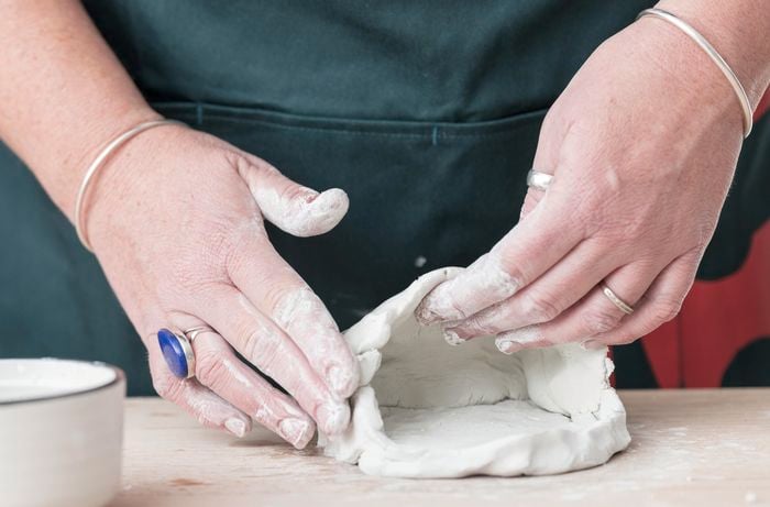 Clay taking the shape of a monster's head