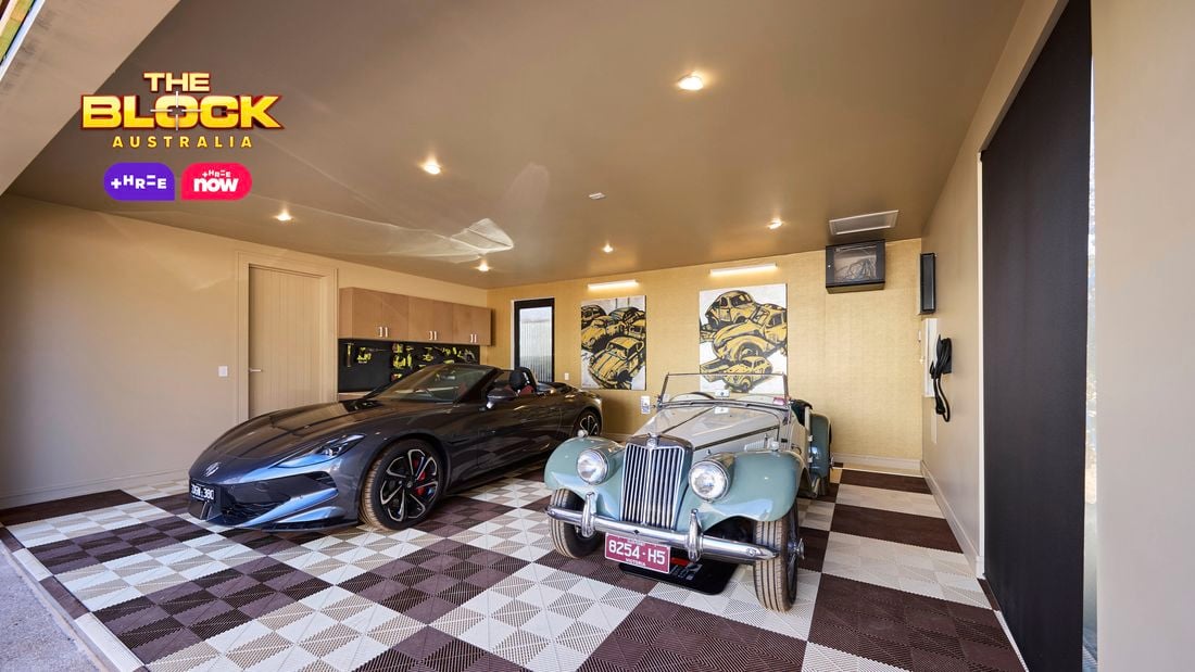 Garage from The Block with patterned flooring, storage cabinetry, and two luxury cars.