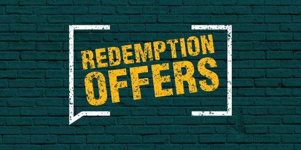 Graphic of redemption offers on a green brick background