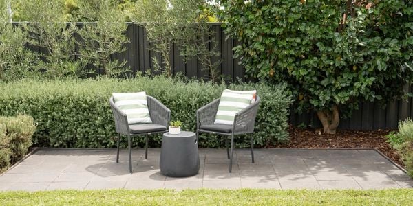 A stylish patio with grey base for pavers