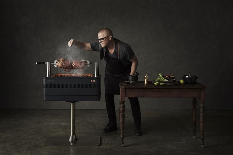 Heston Blumenthal bouncing salt grains off a chicken into the coalpit of his grill