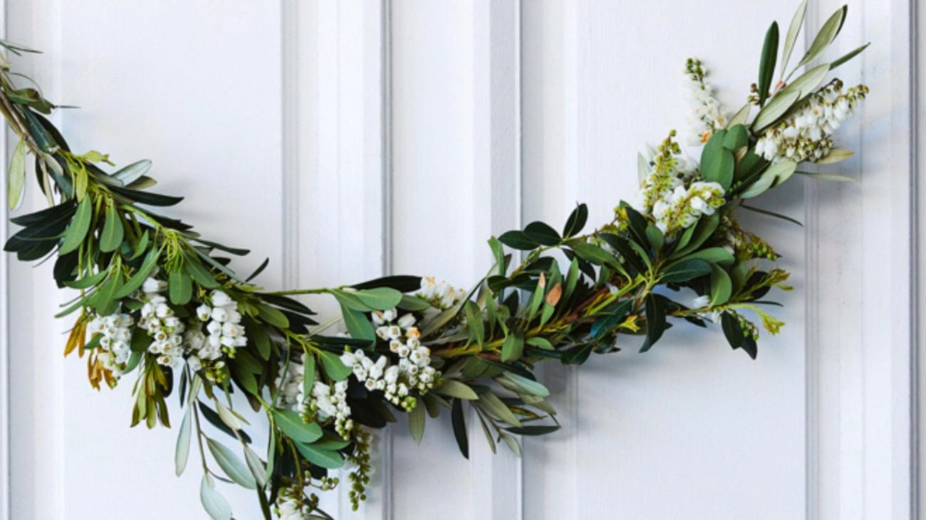 Christmas wreath with leaves and flowers.