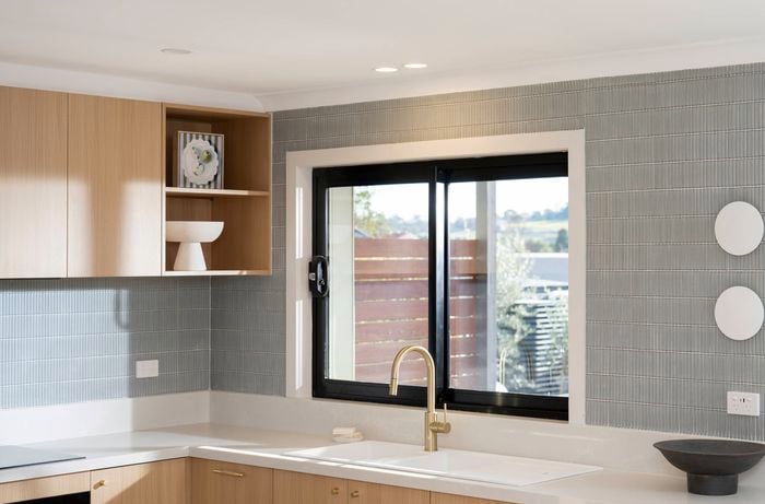 To make your kitchen lighting more flexible, use different switches for main lights, work lights, and feature lights  