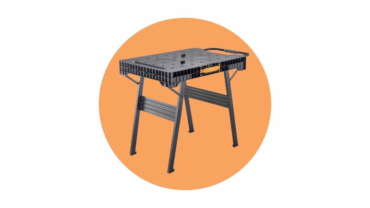  A black portable workbench with grey legs.