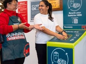 customer recycling old battery at bunnings store