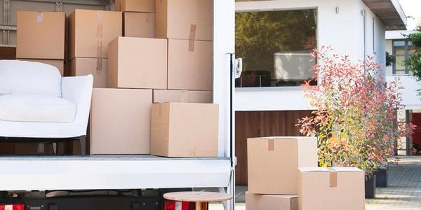 Packing boxes on a truck with table