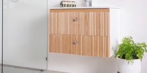 A finished vanity with dowel front panel