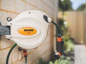 HOLMAN HOSE ON A WALL