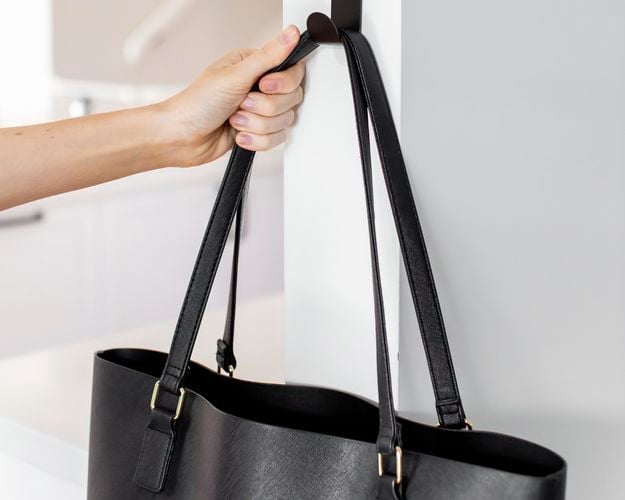 bag on a hook against a wall