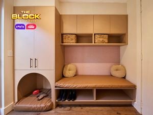 Mudroom from The Block with built-in bench, storage cupboards, baskets, shoe space, and pet nook.