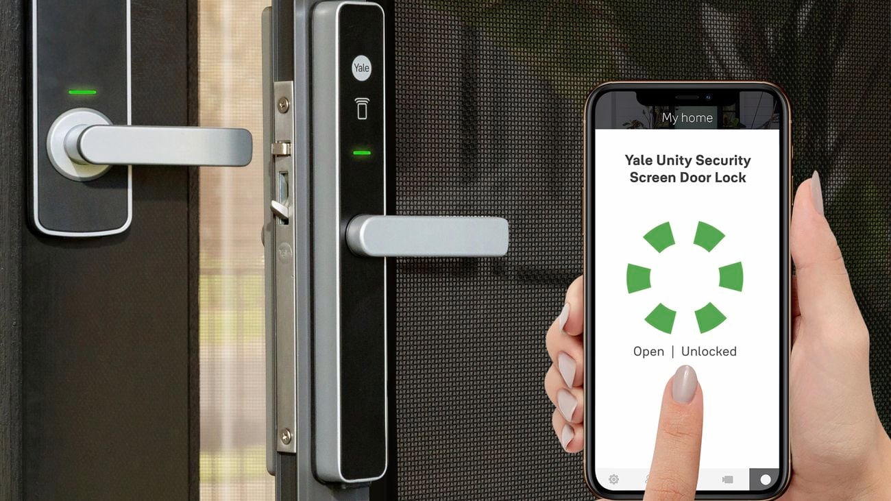 Hand holds phone with a loading screen on it. A door with a smart lock is also pictured, which the phone is wirelessly connecting to