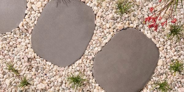 Creating
  a contemporary pathway with natural character is easy with our Bluestone
  Stepping Stones, paired with mixed pebbles and plants. I/N: 0280562
