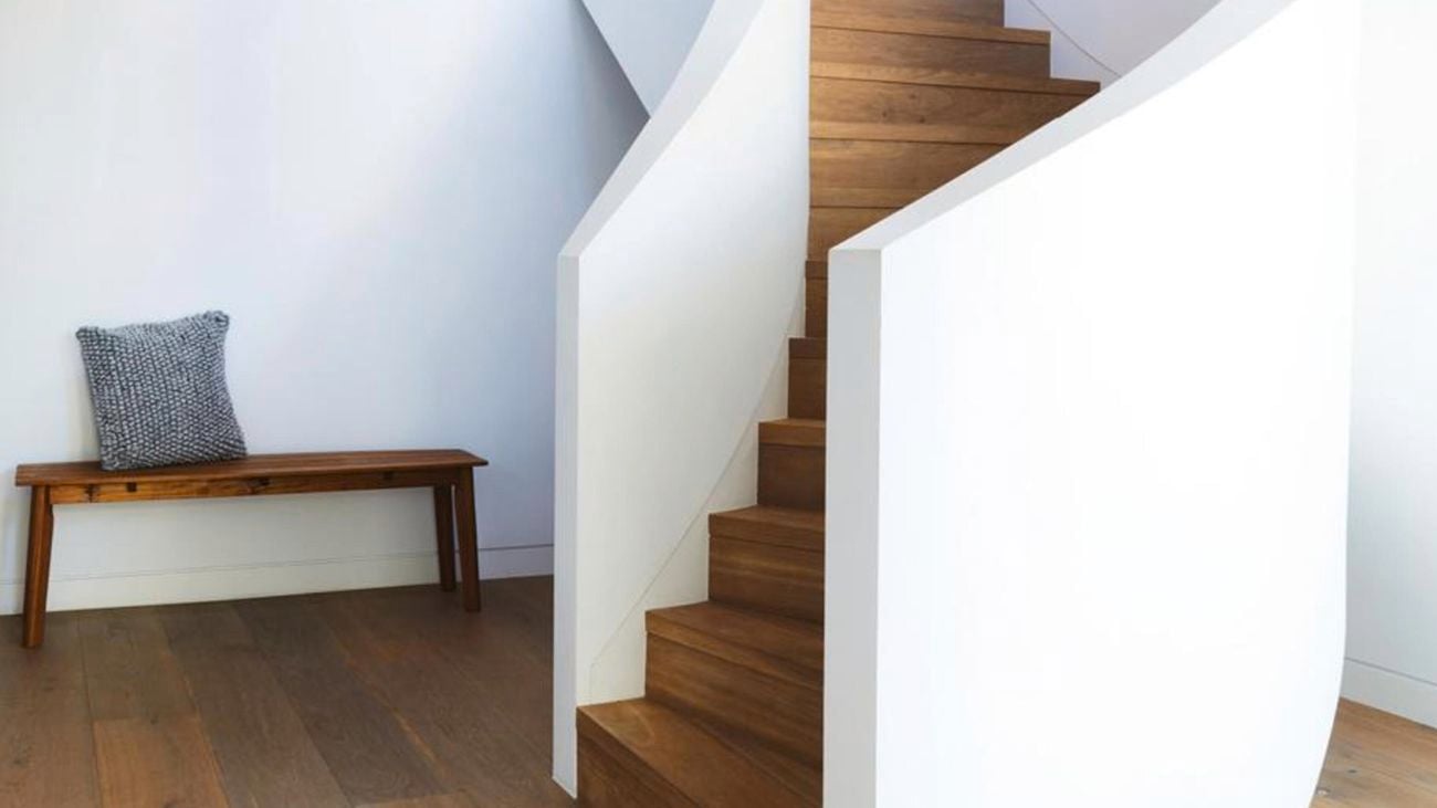 Wooden staircase and timber floorboards.