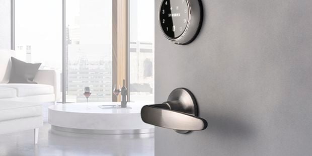 A door with a Samsung smart doorlock
