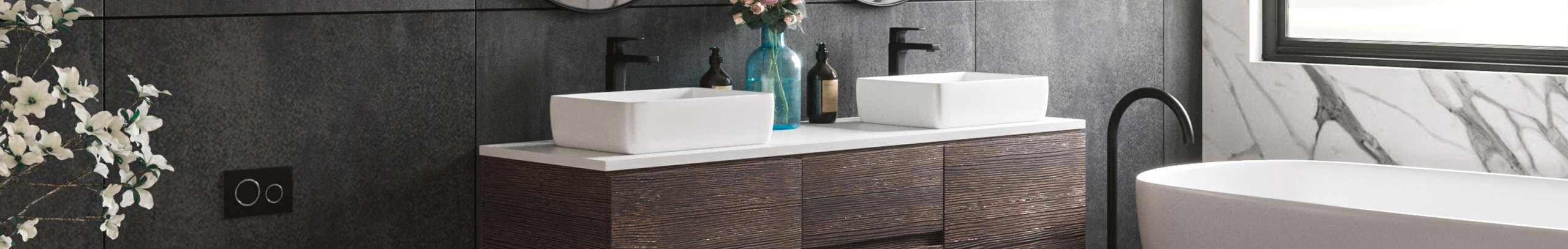 Brown bathroom with a bath and a sink