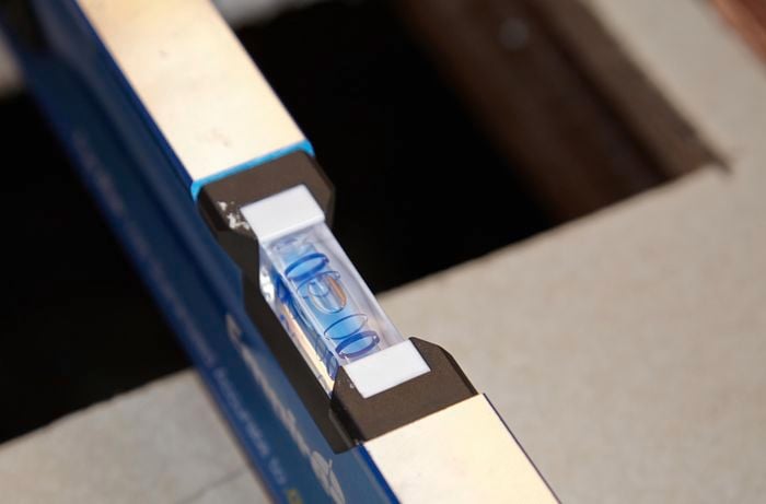 A closeup of the bubble in a spirit level, used to ensure the floor is level