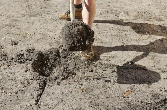 Digging the post hole.