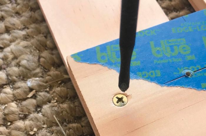 Close-up of timbers joined at right angle using screws