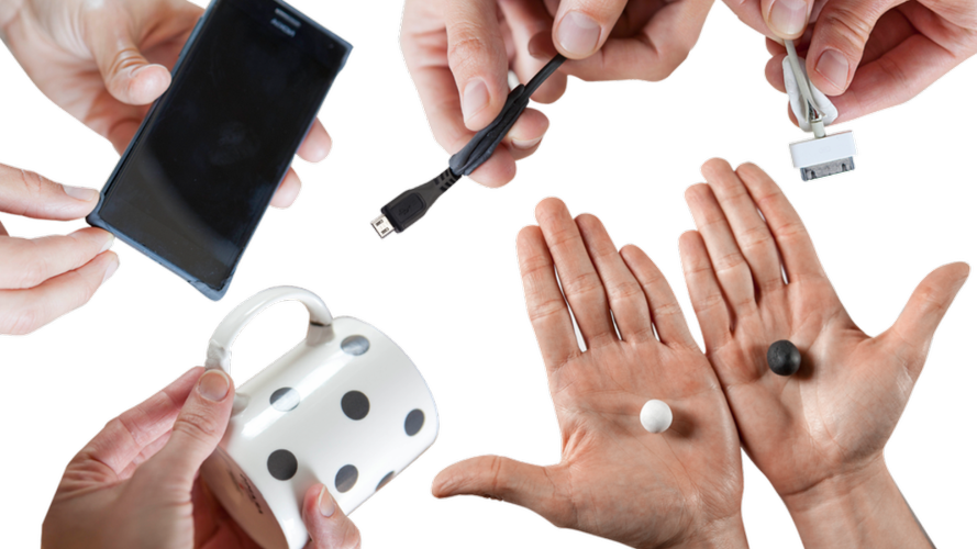 Loctite Kintsuglue in black and white being used to repair a mug, phone and charging cables.