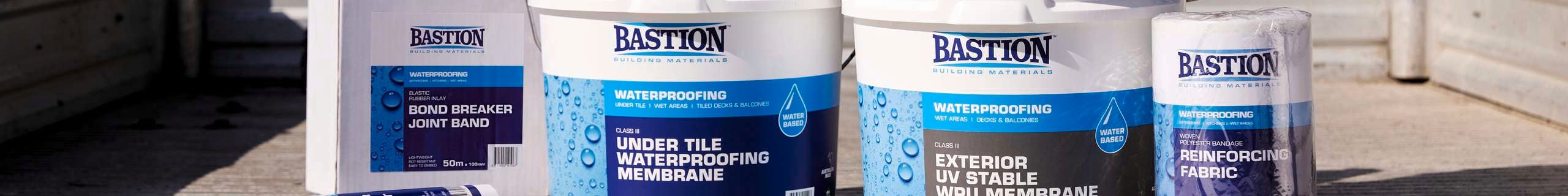 Bastion waterproofing products stacked on the back of a ute.