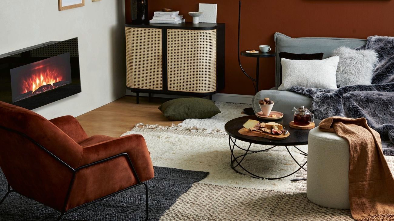 Lounge room styled using rich brown hues. Feature wall painted in Tampico Brown by PPG Paints