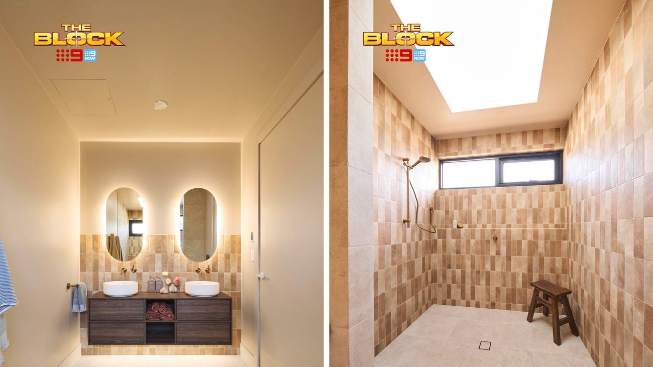 Modern bathroom from The Block with double vanity and large walk-in shower featuring warm-toned tiles.
