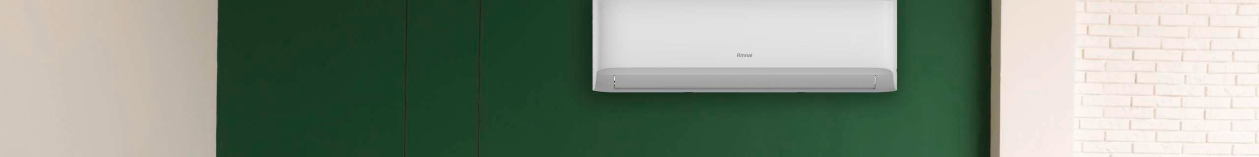 Green living room with air conditioner on wall.