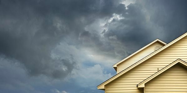 Image of roof with storm brewing 
