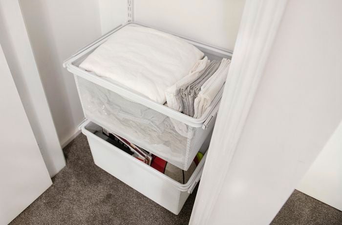 Organisers full of bed linen