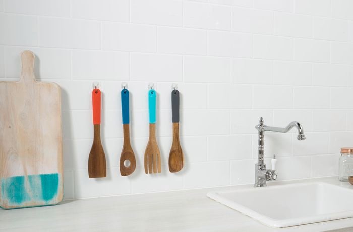 Kitchen utensils hanging on hooks