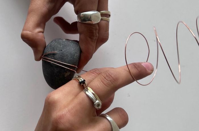 Creating holders for picture place cards using wire and stones