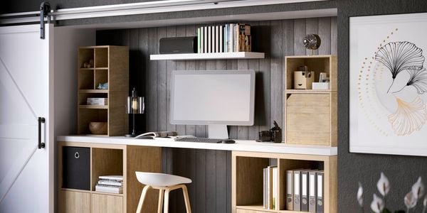 4 x 4 cube storage oak unit with black fabric inserts used as a study desk for a home office