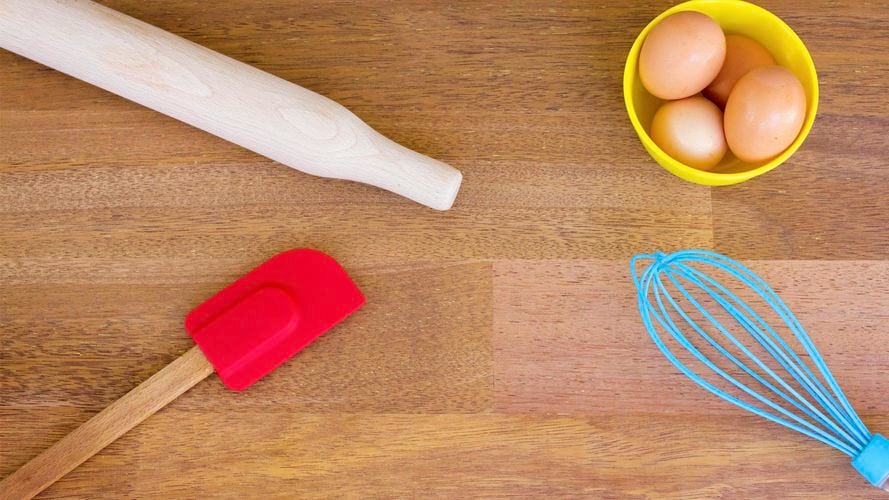 Cooking utensils on a benchtop.