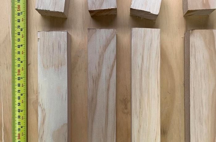 Lengths of timber cut to size next to a tape measure