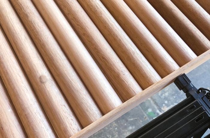 Fixing a timber frame to the ends of dowel rods using a nail gun