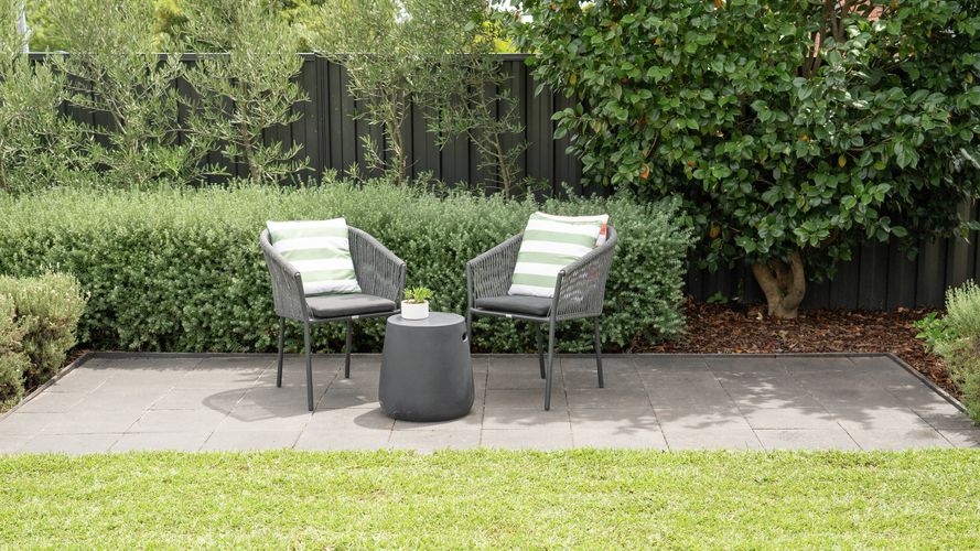 A stylish patio with grey base for pavers