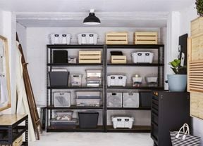 Clean modern garage with storage and shelving
